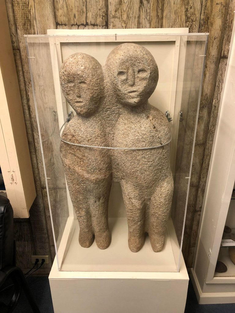 a statue of the moon-eyed people